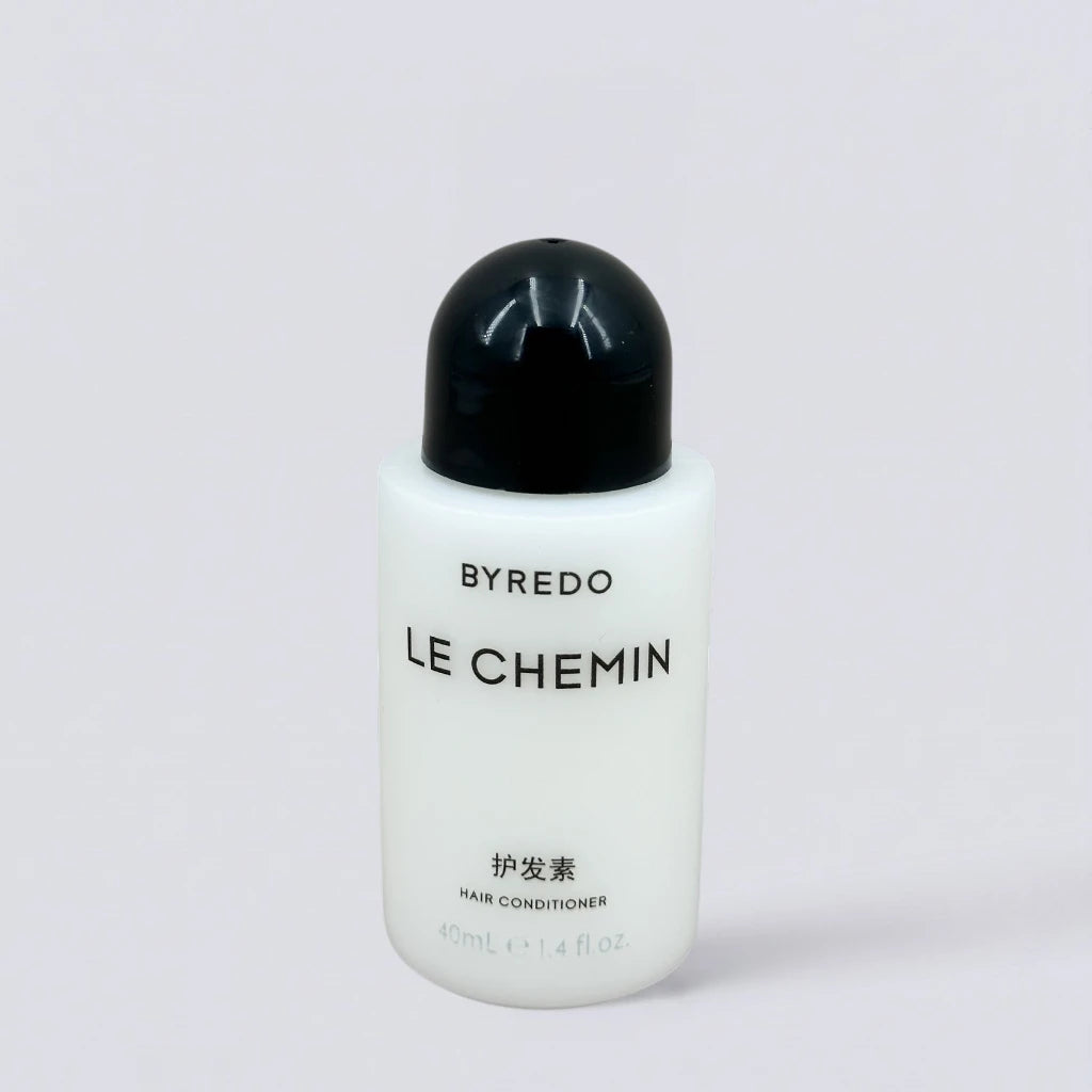 Byredo Le Chemin conditioner, infused with its signature fresh and floral botanical notes, is an exclusive choice for luxury hotel travel-size toiletries and upscale hotel essentials.