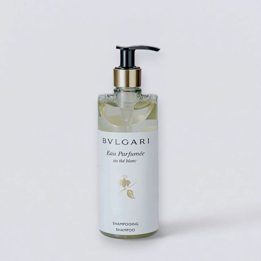 Bvlgari White Tea Shampoo 300ml, the serene signature scent of Bvlgari Hotels. Gentle Eau Parfumée au Thé Blanc hair care by Luxe Hotel Essentials.