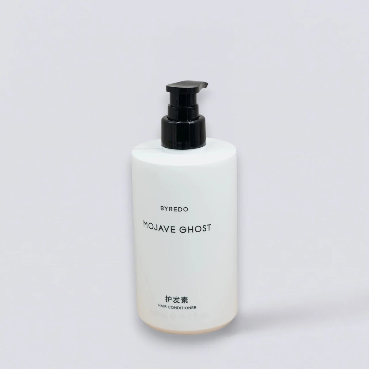 BYREDO Mojave Ghost Conditioner 450ml, premium hair repair with the hauntingly beautiful BYREDO scent. Professional formula by Luxe Hotel Essentials.