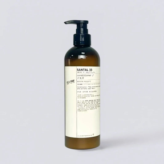 Le Labo Santal 33 Conditioner 480ml, premium hair repair with the cult-classic EDITION fragrance. Nourishing botanical formula by Luxe Hotel Essentials.