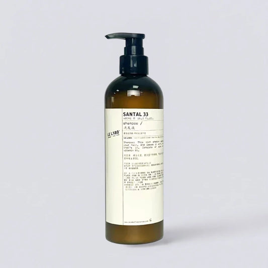 Le Labo Santal 33 Shampoo 480ml, the iconic woody scent of EDITION Hotels. Professional lab-style hair care by Luxe Hotel Essentials.