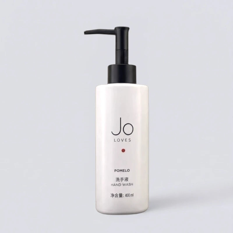 Jo Loves Pomelo & Cedarwood Hand Wash 400ml, luxury hotel bathroom essentials. Signature vibrant "Pomelo" scent for hands by Luxe Hotel Essentials.