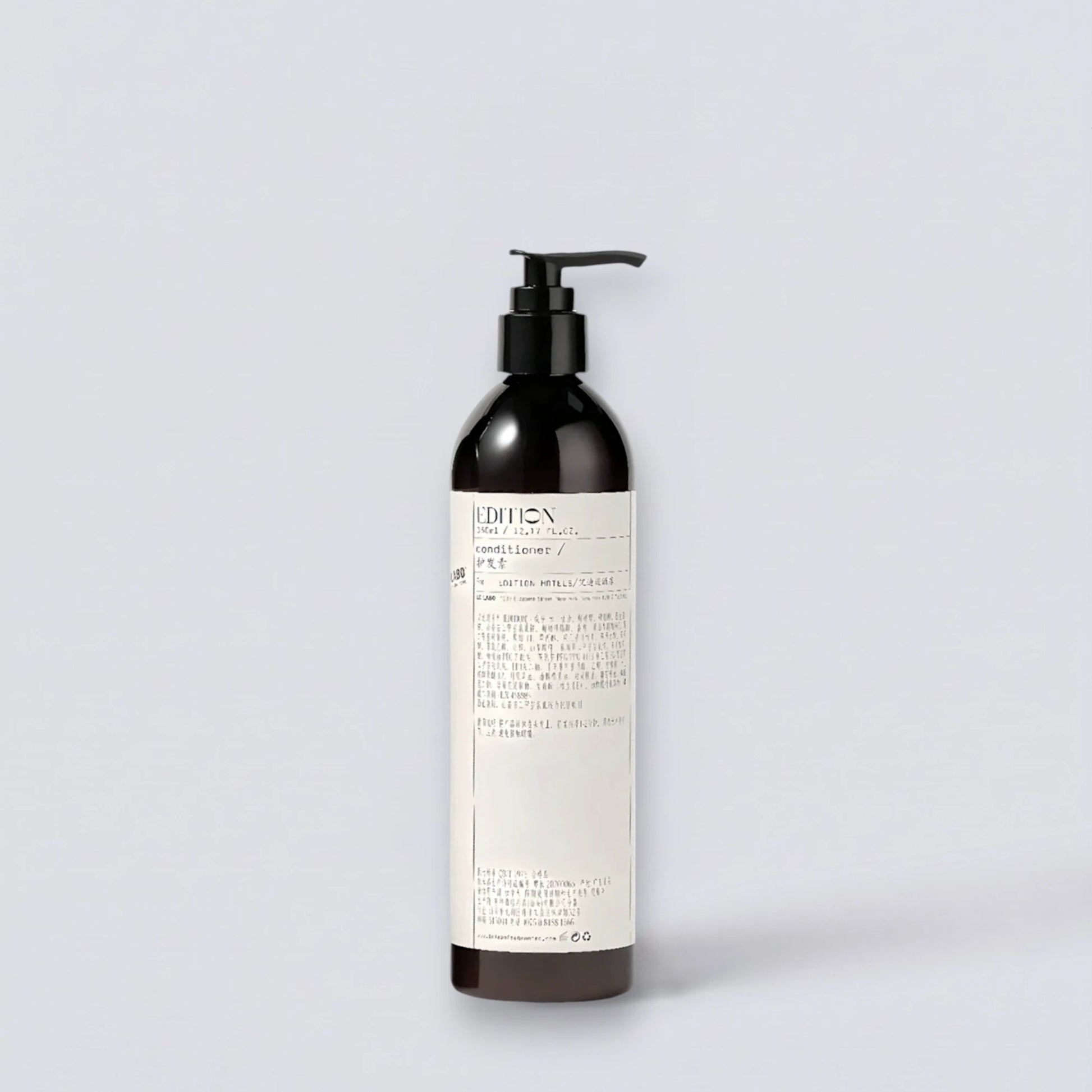 Le Labo Santal 33 Conditioner 360ml, premium hair repair with the cult-classic EDITION fragrance. Nourishing botanical formula by Luxe Hotel Essentials.