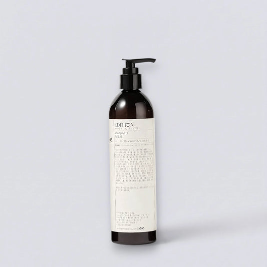 Le Labo Santal 33 Shampoo 360ml, the iconic woody scent of EDITION Hotels. Professional lab-style hair care by Luxe Hotel Essentials.
