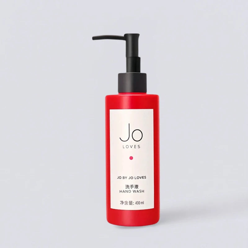 Jo Loves Red Edition Hand Wash 400ml, luxury hotel bathroom essentials. Signature vibrant "Pomelo" scent for hands in a signature red bottle by Luxe Hotel Essentials.