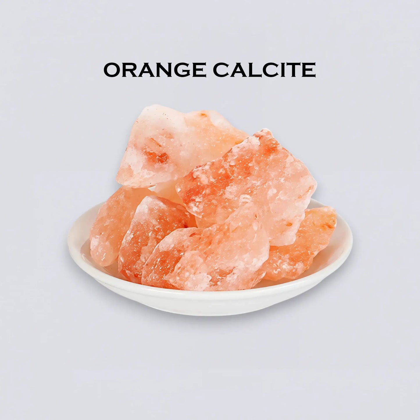 Natural Orange Calcite 100g, the stone of creativity and confidence. Vibrant raw crystal diffuser for an uplifting atmosphere by Luxe Hotel Essentials.