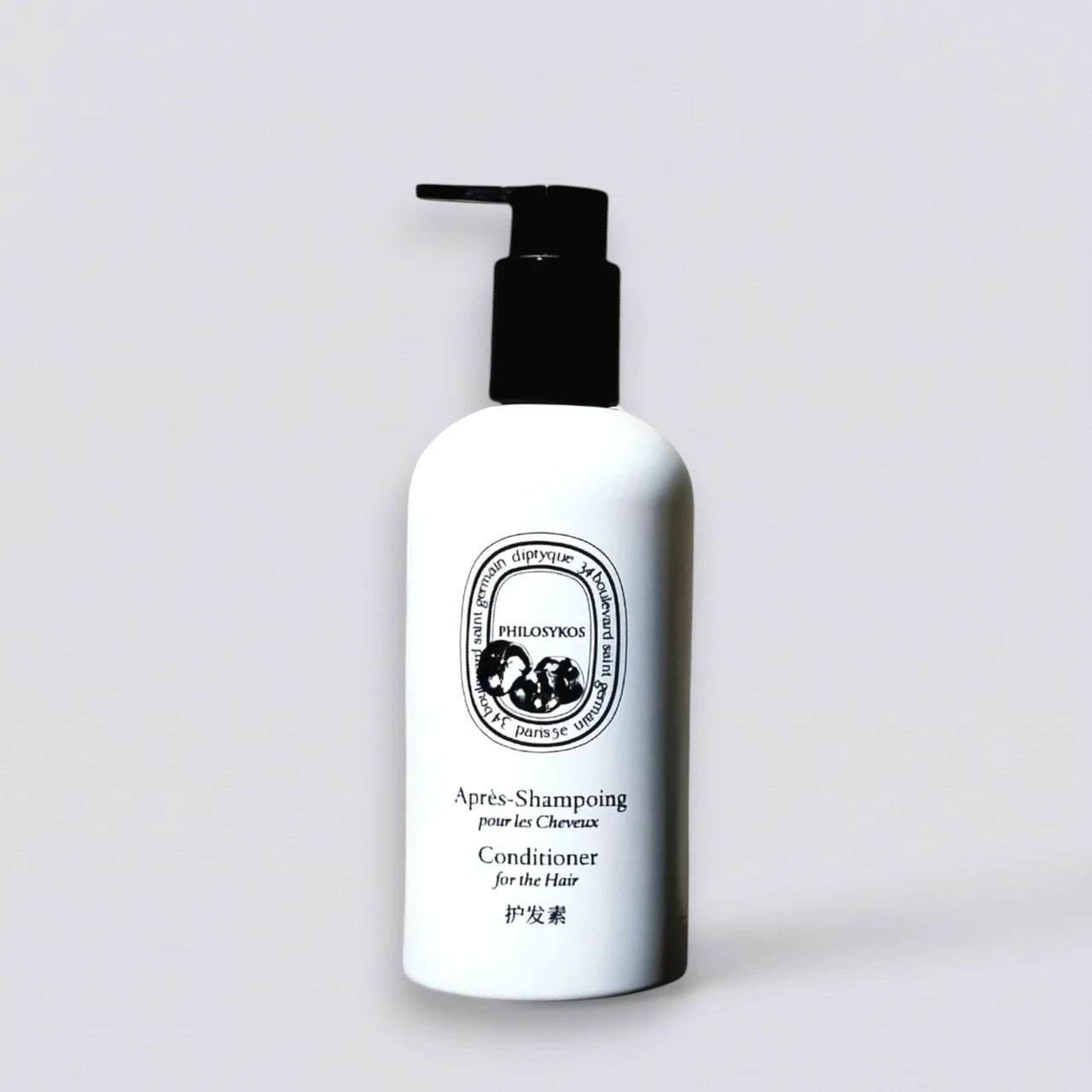 DIPTYQUE Philosykos Conditioner 300ml, premium hair repair inspired by Ritz-Carlton Hotel amenities. Nourishing woody and fruity formula by Luxe Hotel Essentials.